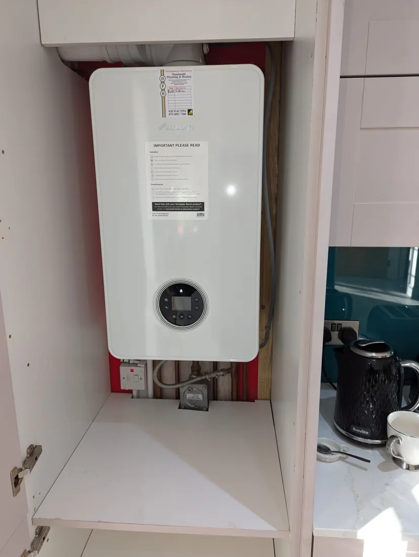 Gas boiler in a kitchen unit &ndash; Worcester Bosch, by Dundonald Plumbing & Heating